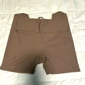 Athleta pacesetter tight. Mauvey brown color. Size L